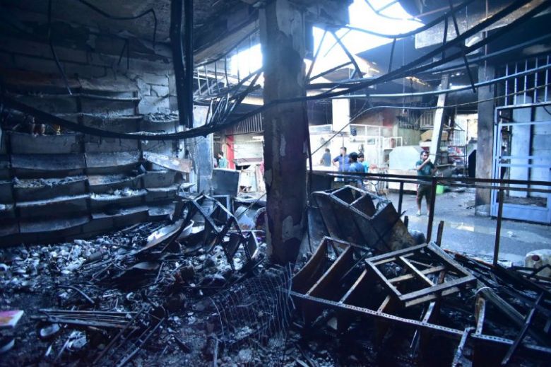 الدفاع المدني يسيطر على حريق في سوق شعبي غرب كربلاء